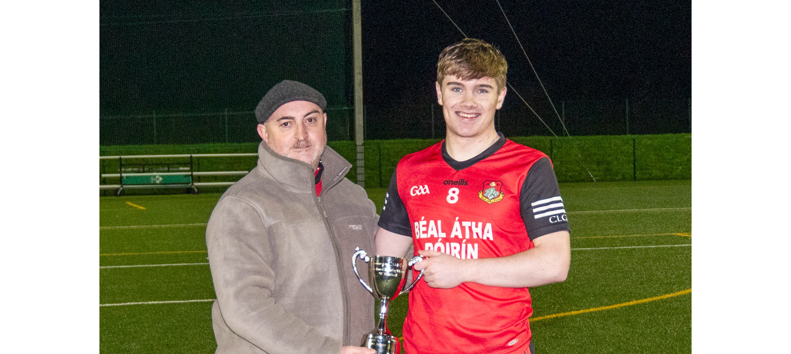 Ballyporeen captain Jason King receives the cup from Declan Hickey, Vice Chairman of South Tipperary Bord na nÓg. Picture: Michael Boland