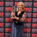 Anne Williamson with her Indie X Awards Best First Time Female Film Director trophy