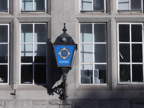 A garda sign outside a station