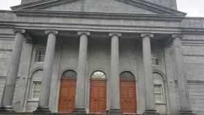 Garda catches woman driving with 13 year old son 'hanging out' car window