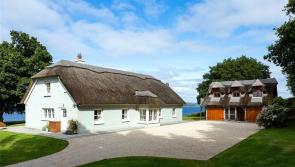 WOW: This lakeside thatched country home is on sale in Tipperary for €1,150,000