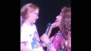 Let's go girls: Eight-year-old sings on stage with Shania Twain 