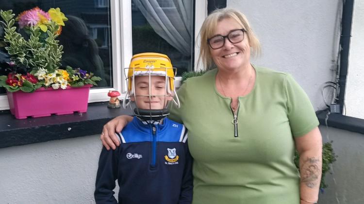 Young Tipperary hurling fan delighted after social media helps track down rare helmet