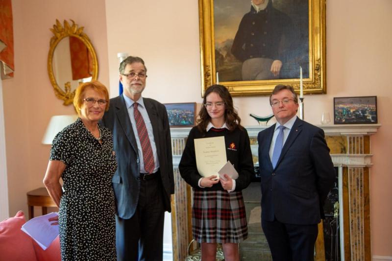 A student and teacher from Coláiste Phobal Roscrea win prizes at this year's  German Essay Writing Awards