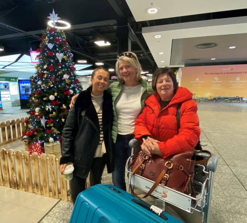 Grainne Flynn and Mary Collins (Abbeyfeale) welcome home their sister and aunt Bríd, who just arrived in Shannon Airport having travelled home from Sydney via London Heathrow -  her first time home si