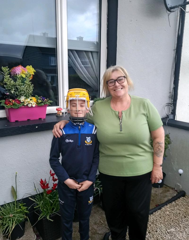 Young Tipperary hurling fan delighted after social media helps track down rare helmet
