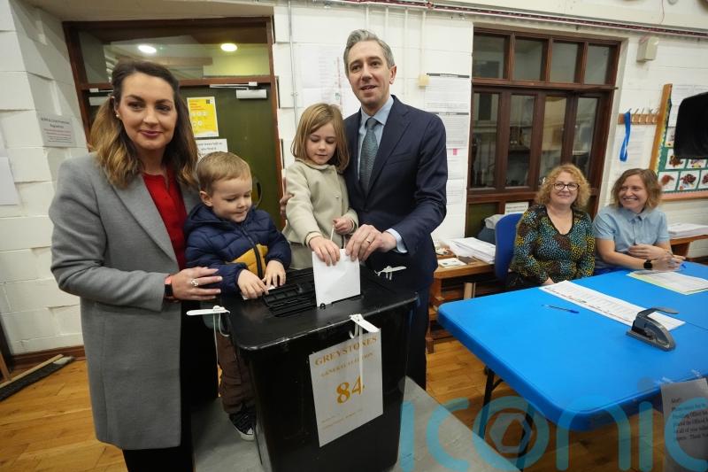 Irish premier casts vote with his family early as General Election under way