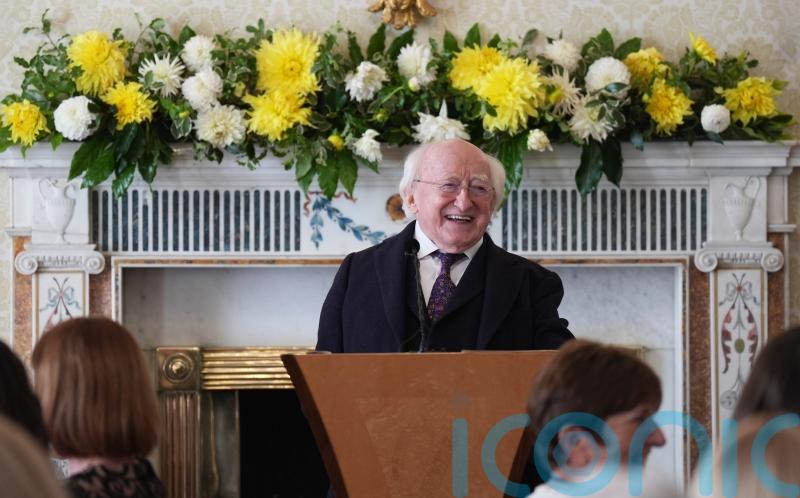 Higgins hosts 100 visitors at final afternoon tea reception of his presidency