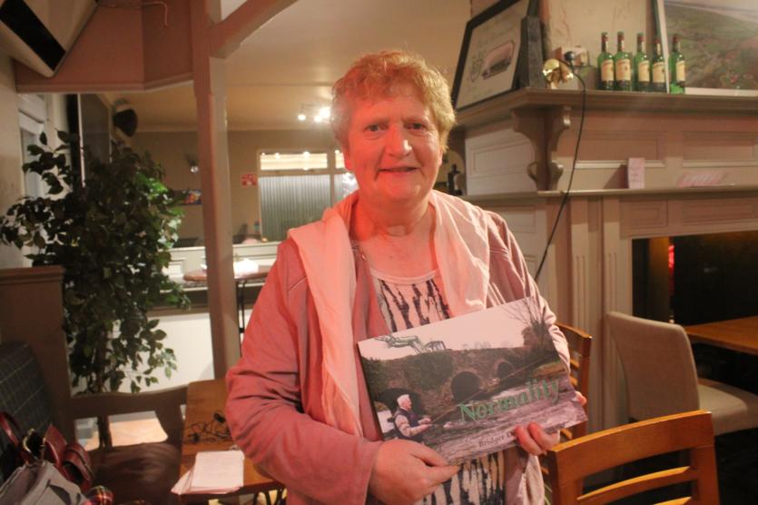 Bridget Delaney with her book Normality at Reidy's of Newtown